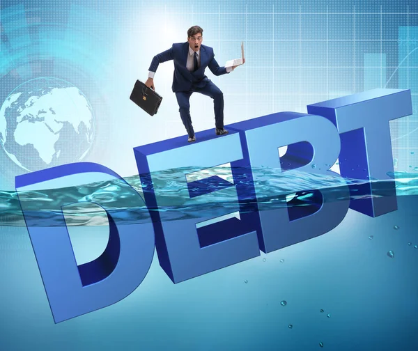 Бизнесмен в долговой бизнес-концепции — стоковое фото