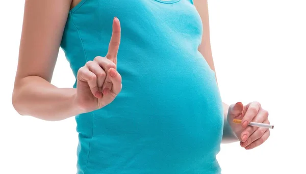Беременная женщина изолирована на белом фоне — стоковое фото