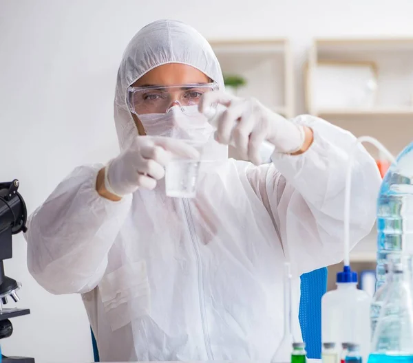 Lab assistant testing water quality