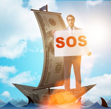 İş adamı teknedeki SOS mesajı için yardım istiyor.