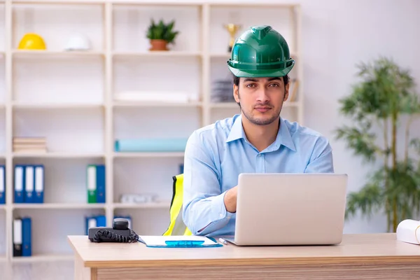 Young male architect working in the office — Stock Photo, Image