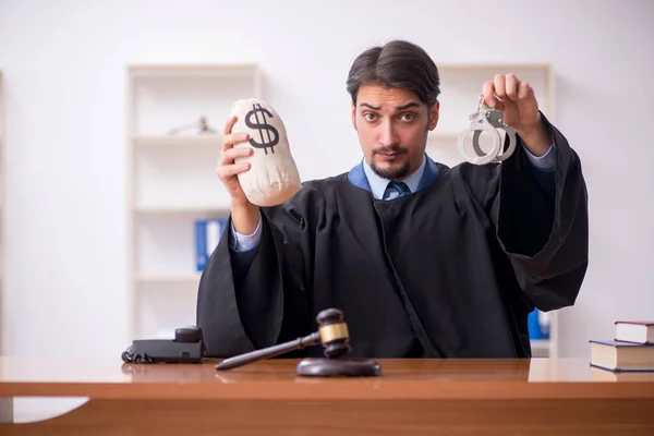 Young male judge working in the courtroom — Stock Photo, Image