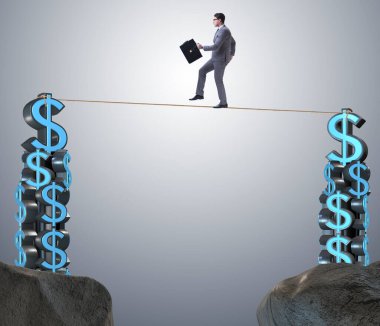 İş adamı sıkı bir ipte yürüyor