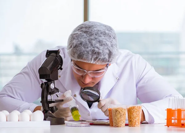 Nutrition expert testing food products in lab