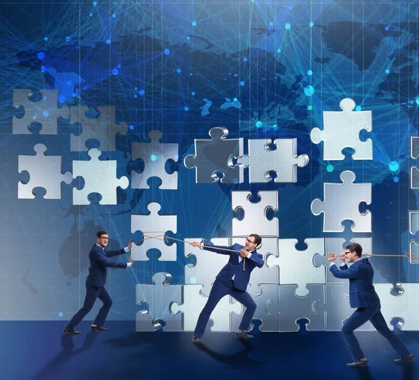Concetto aziendale di lavoro di squadra con pezzi puzzle — Foto Stock