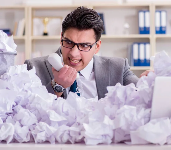 Businessman in paper recycling concept in office — Stock Photo, Image