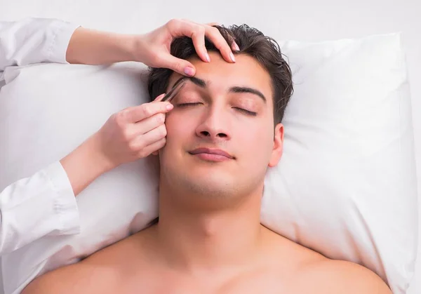 Handsome man in spa massage concept — Stock Photo, Image