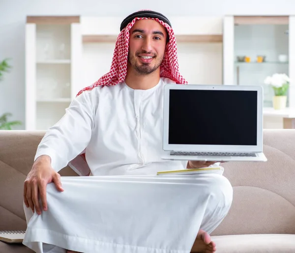 Arab man working at home on his work — Stock Photo, Image