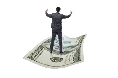 İş adamı 100 dolarlık banknotla uçuyor.