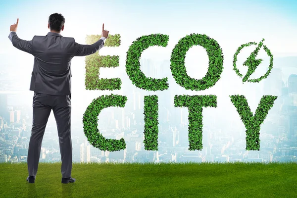 Eco ciudad en concepto de ecología con empresario —  Fotos de Stock