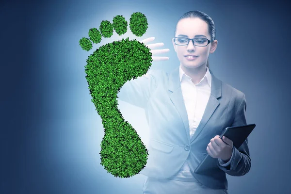 Concepto de ecología con huella verde y mujer de negocios —  Fotos de Stock