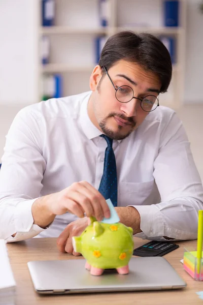 Young male bookkeeper in pension concept — Stock Photo, Image