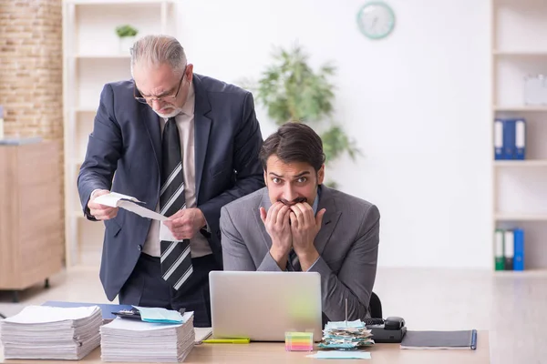 Two male bookkeepers in budget planning concept in the office — Stock Photo, Image