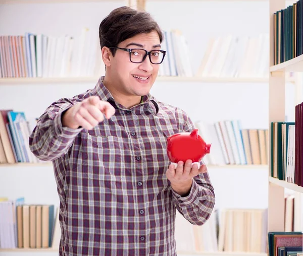 Junge Studentin in teurem Lehrbuchkonzept — Stockfoto