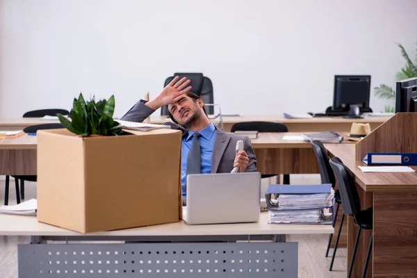 Young male employee being fired from his work — Stock Photo, Image