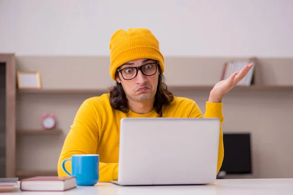 Young male student preparing for exams at home — Stock Photo, Image