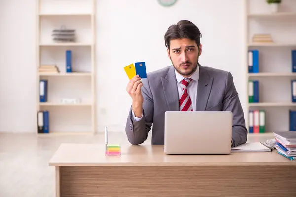 Young businessman employee in ecommerce concept — Stock Photo, Image