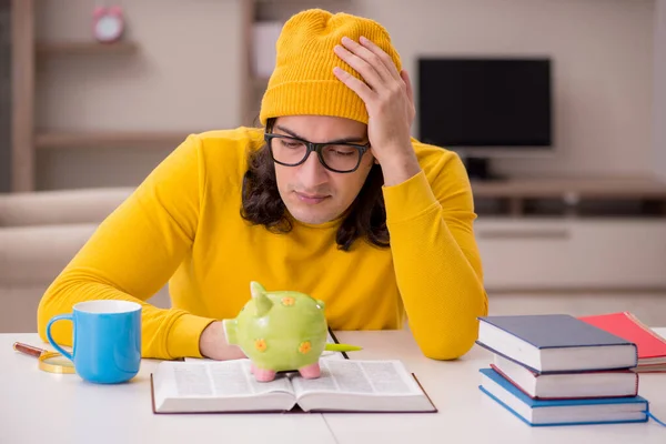 Young male student preparing for exams at home — Stock Photo, Image