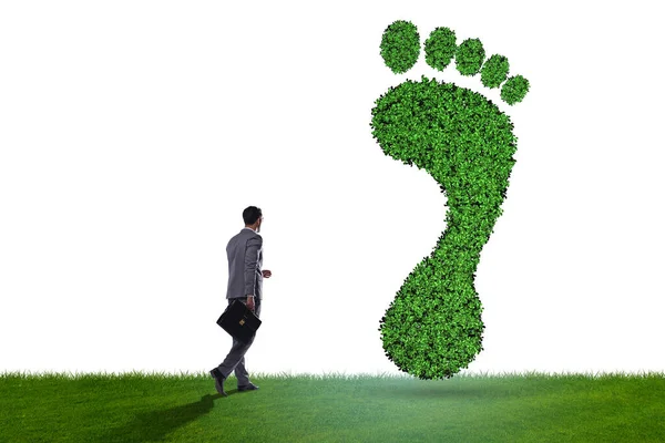 Concepto de ecología con huella verde y empresario — Foto de Stock