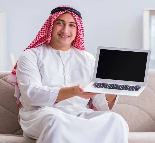 Arab businessman working sitting at couch — Stock Photo, Image