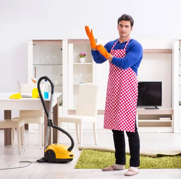 Contractor man cleaning house doing chores — Stock Photo, Image