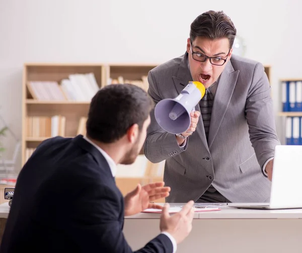 Angry boss shouting at his employee — Stock Photo, Image