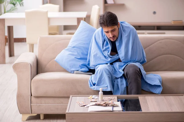 Young man feeling bad at home — Stock Photo, Image