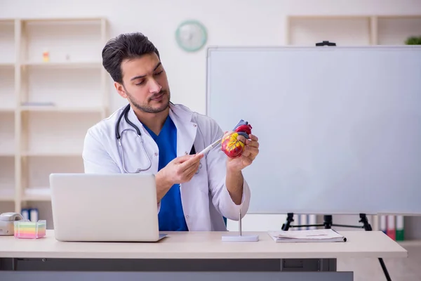 Young male doctor cardiologist in the classroom — Stock Photo, Image