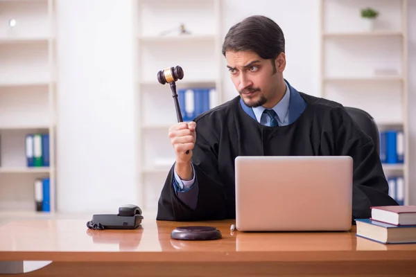 Young male judge working in the courtroom — Stock Photo, Image