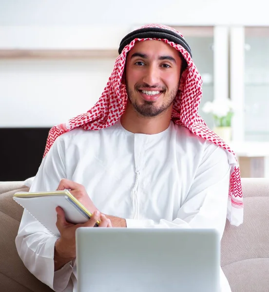 Arab man working at home on his work — Stock Photo, Image