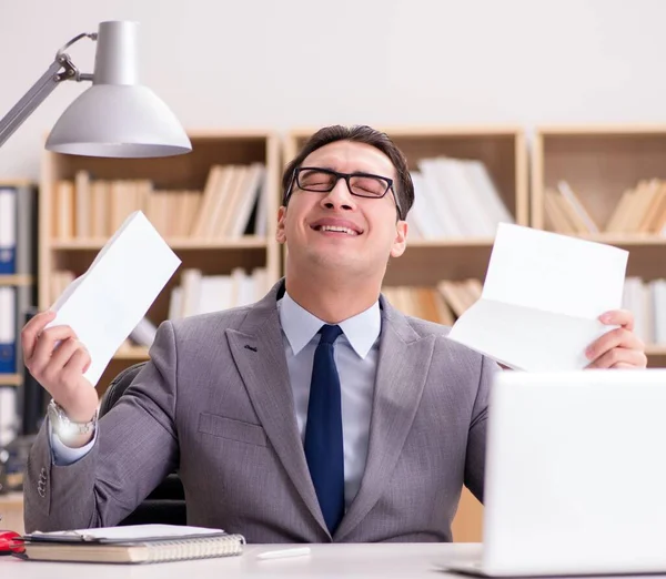 Businessman receiving letter in the office