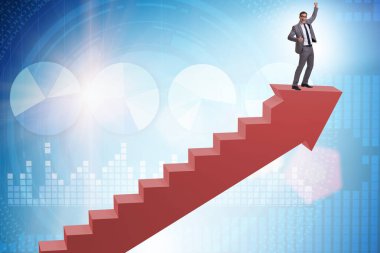 İş adamı iş dünyasında kariyer basamaklarını tırmanıyor