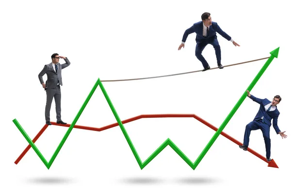 Empresario equilibrándose en la cuerda floja en el gráfico de líneas — Foto de Stock