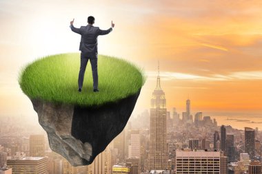 Yüzen adada iş adamı konsepti