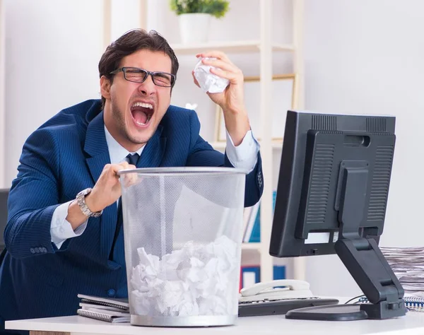 Young handsome businessman employee working in office in paperwo — Stock Photo, Image
