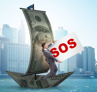 İş adamı teknedeki SOS mesajı için yardım istiyor.