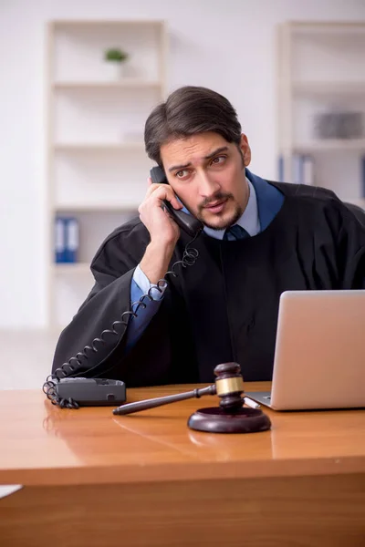 Young male judge working in the courtroom — Stock Photo, Image