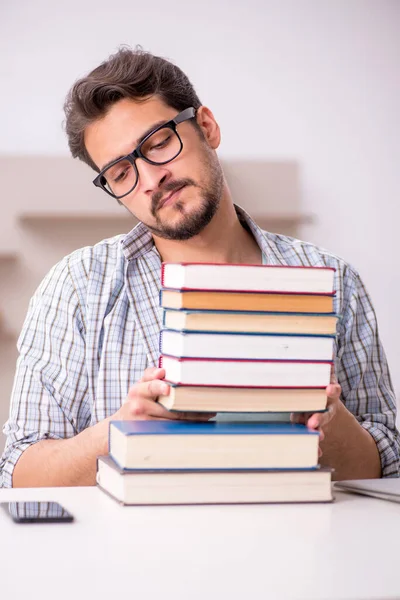 Young male student preparing for exams at home — Stock Photo, Image