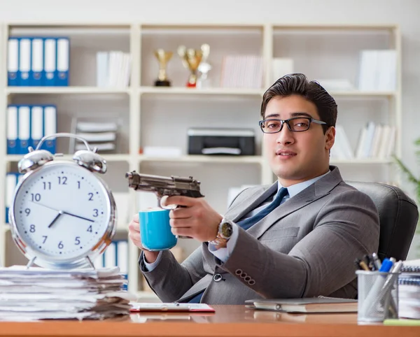 Ung affärsman i time management koncept — Stockfoto