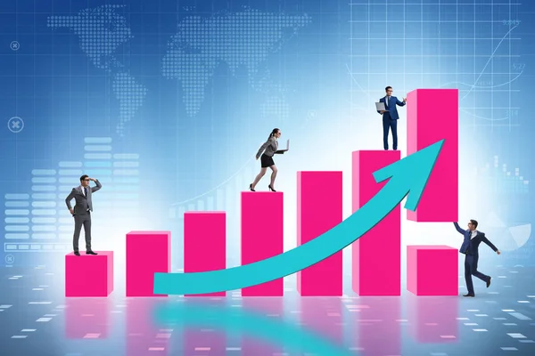 Business people supporting economic growth on chart — Stock Photo, Image