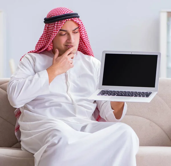 Arab businessman working sitting at couch — Stock Photo, Image