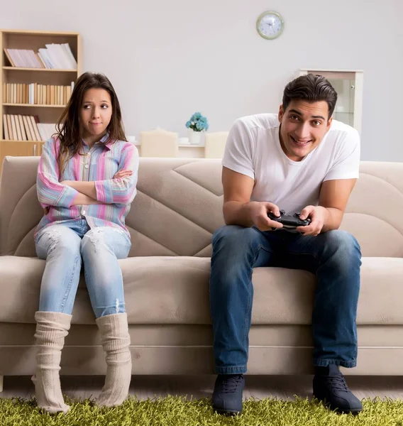 Young family suffering from computer games addiction — Stock Photo, Image