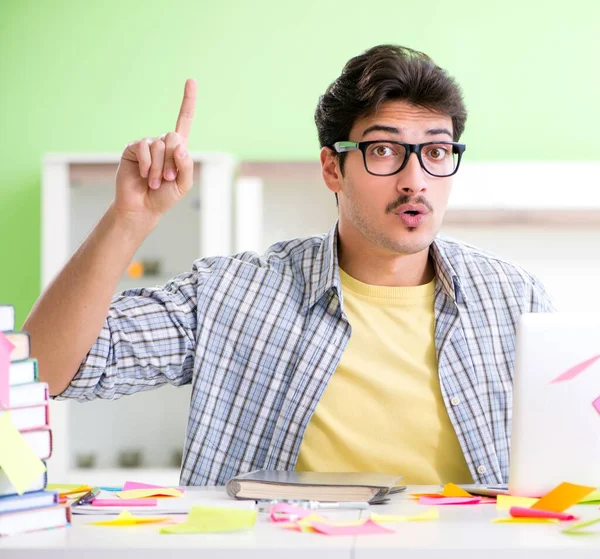 Student preparing for university exams with many conflicting pri — Stock Photo, Image