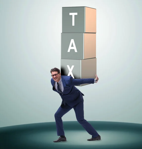 Podnikatel podle těžkých daňové zatížení — Stock fotografie