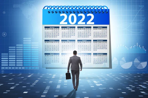 Zakenman in het kalenderconcept van jaar 2022 — Stockfoto