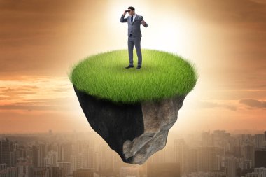 Yüzen adada iş adamı konsepti