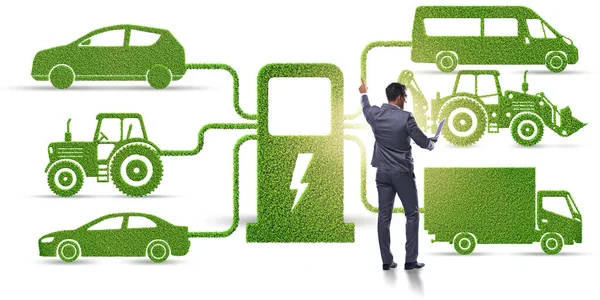 Biznesmen w koncepcji ładowania elektrycznego i pojazdów — Zdjęcie stockowe
