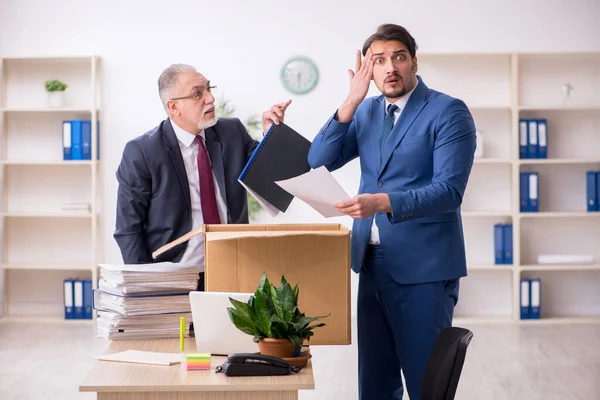 Two male employees in dismissal concept — Stock Photo, Image