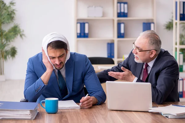 Young male employee suffering from toothache in the office — Stock Photo, Image