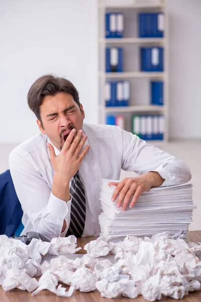 Young male employee in brainstorming concept — Stock Photo, Image